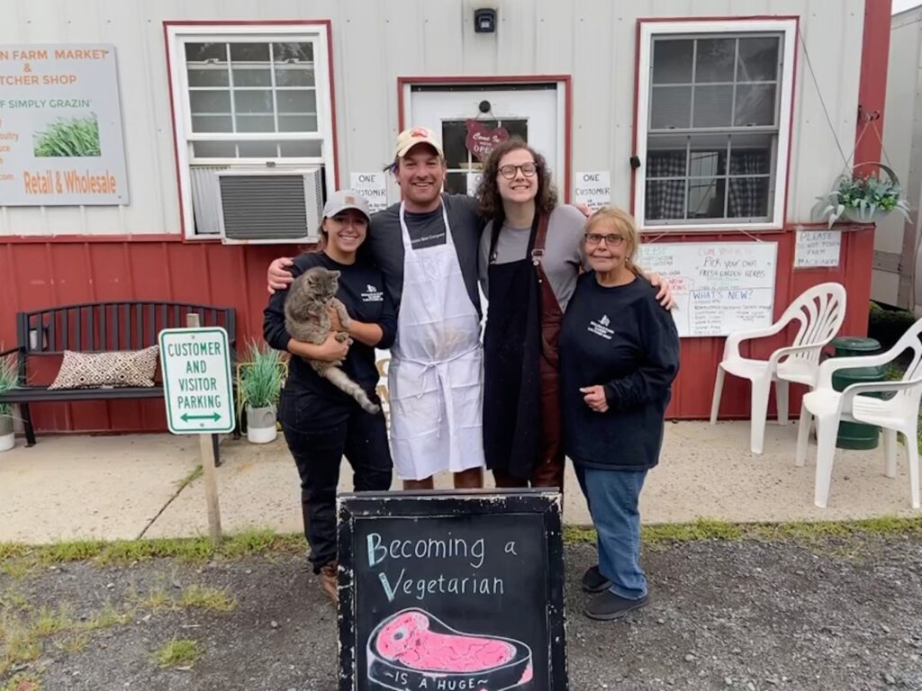 Stacie, Doug, Julia and Denise together outside the shop.