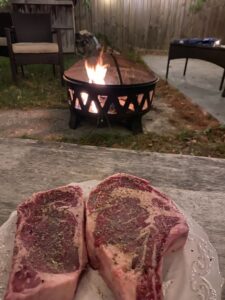 Summer night cookout of delicious Skillman Farm Market and Butcher Shop ribeyes