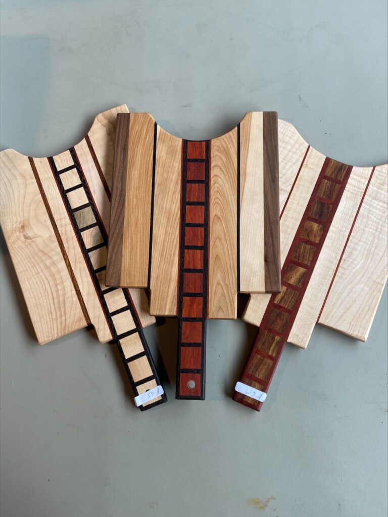 handmade wooden cutting or chacuterie boards
