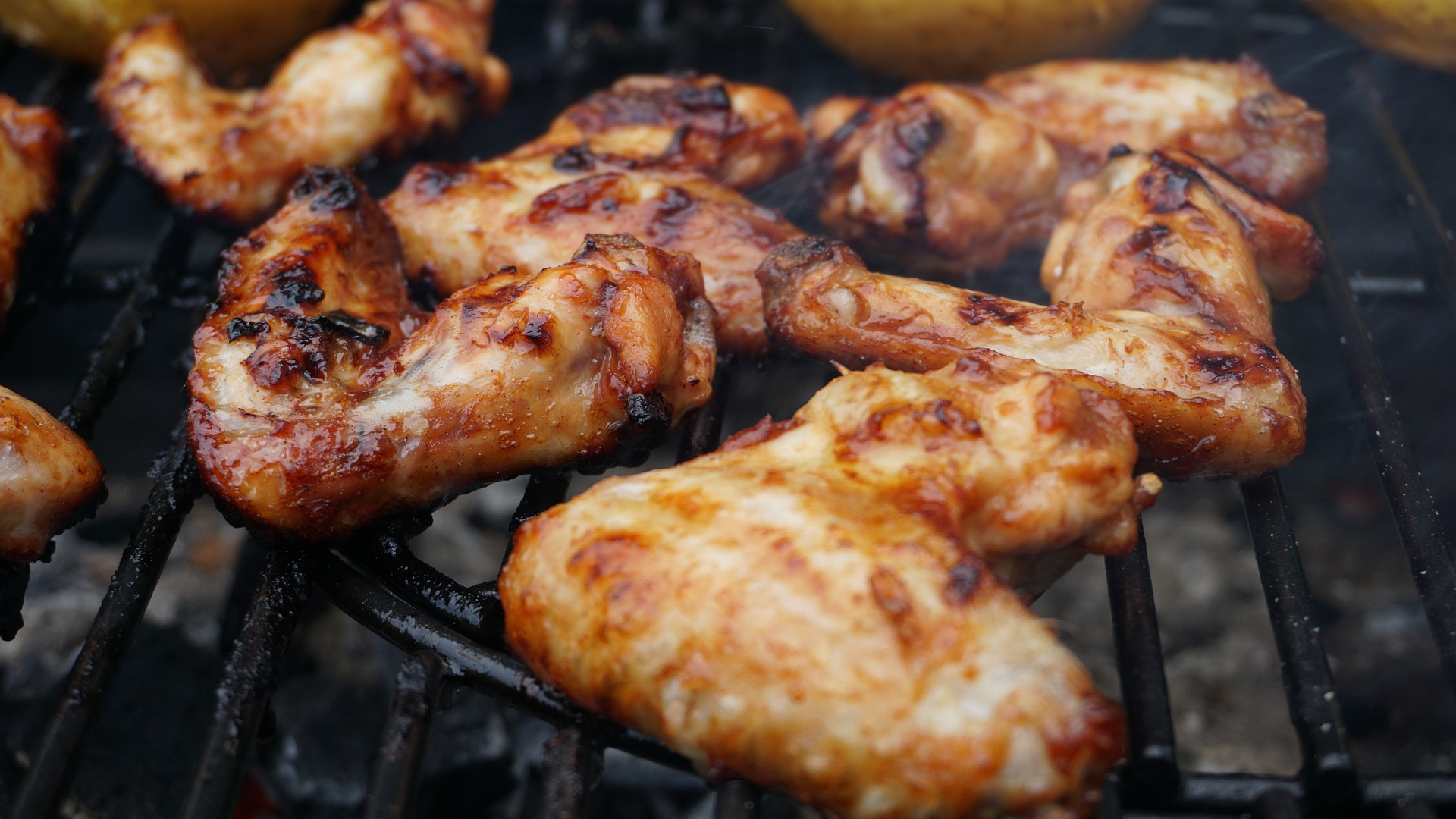 Fresh Whole Chicken Wings on the grill